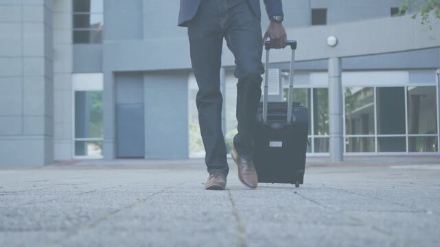 Business traveler stepping forward, pulling suitcase to office, wheels rolling as scanlines overlay