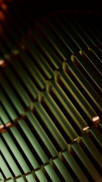 Industrial Inspired Metallic Fins In Rhythmic Undulating Pattern With High Contrast Lighting
