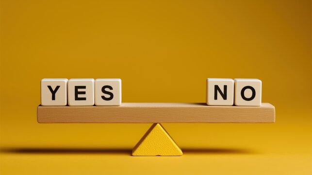 Wooden blocks with Yes and No words balancing on a seesaw scale. Business choice, decision making and dilemma concept on yellow background