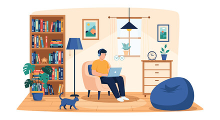 Fototapeta premium Young man wearing headphones sits comfortably in an armchair working on his laptop at home while his black cat walks across the wooden floor.