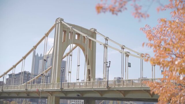 Close-Up of Roberto Clemente Bridge with Pittsburgh Skyline and Autumn Foliage