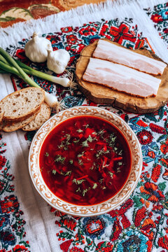 Traditional Ukrainian Borscht Soup with Bread and Fresh Ingredients. AI generative.