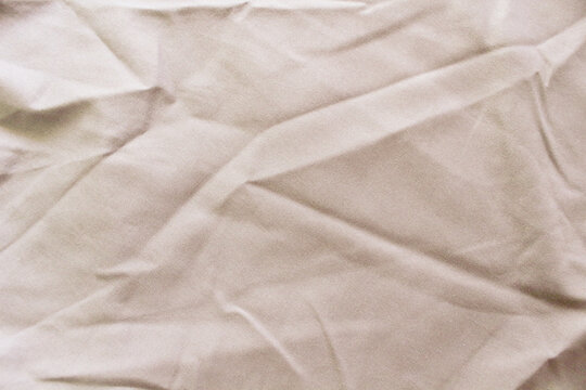 Crumpled Beige Linen Fabric Texture Background, Natural Wrinkled Cotton Cloth Close-Up