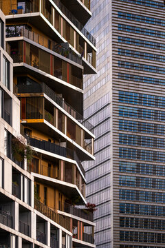 Vertical residential tower in Paris France shows modern apartment facade with balconies and windows creating strong urban architecture exterior detail