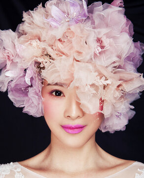 Asian women in white clothing