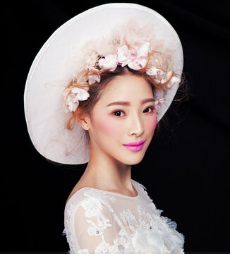 Asian women in white clothing