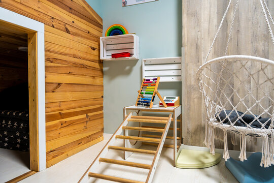 Colorful playroom with abacus and macrame swing chair