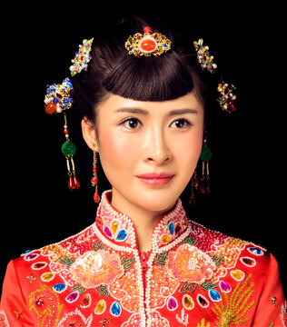 Asian women in red ancient costumes