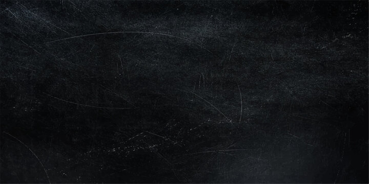 A textured black chalkboard displays various scratches and marks, offering a tactile representation of age and use.
