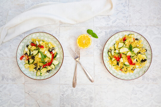 Vegetarian zucchini couscous salad with feta cheese