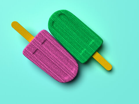 Pink and green knitted popsicles on turquoise background