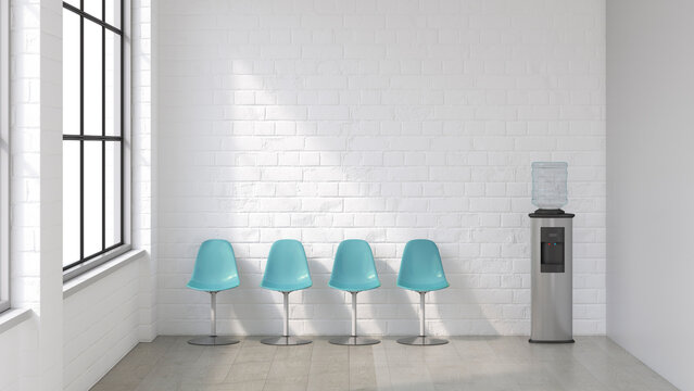 Empty waiting area with four blue chairs and a water cooler