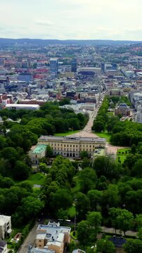 Vertical video. Oslo, Norway. Royal Palace. Slottsplassen. Palace park. Drone footage, Point of interest. Rich colors