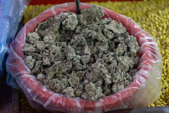 Tequesquite for sale at a market stall.