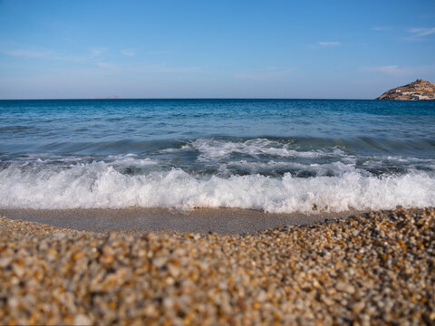 View from Kalafati beach to the fishing village on the island of Mykonos in Greece