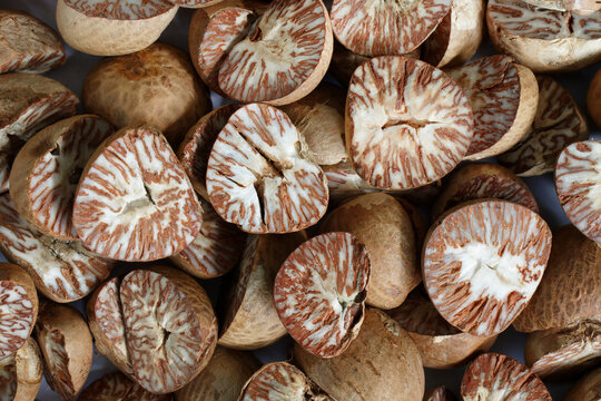Close up of dried sliced Betel Nut or Areca Catechu, The fruit of the Areca palm.