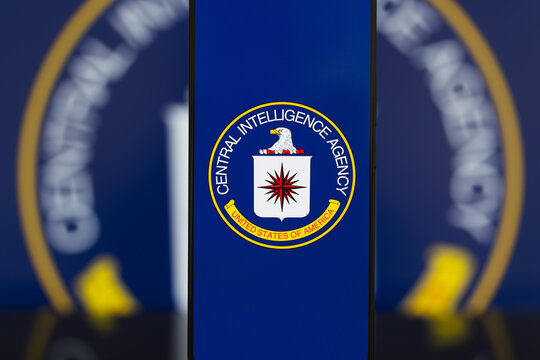 CIA logo displayed on a smartphone screen, Central Intelligence Agency seal on mobile device for national security, intelligence, and government research communication