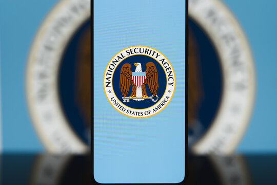 National Security Agency (NSA) seal displayed on a smartphone screen, representing US signals intelligence, cybersecurity, and national security oversight