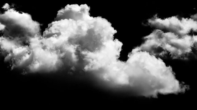 A wispy, fluffy cloud formation floats against a stark black background, creating a dramatic contrast