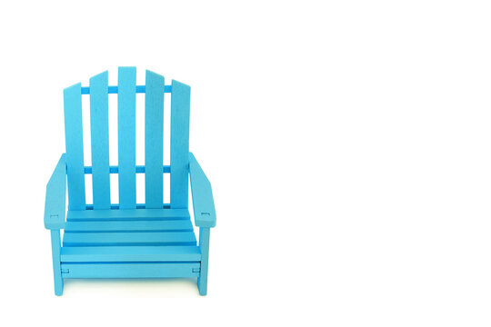 Wooden blue slatted armchair modern design. Indoor or outdoor patio chair furniture simple classic decor on white background.
