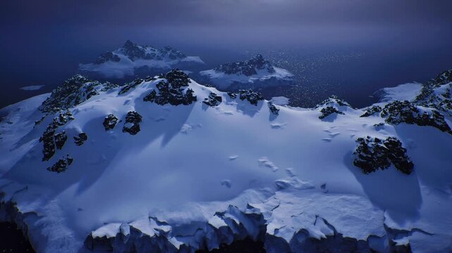 Dark clouds gathering over icy headland, dramatic weather scene with rugged cliffs, wind scoured snow and churning ocean, heightened contrast and motion