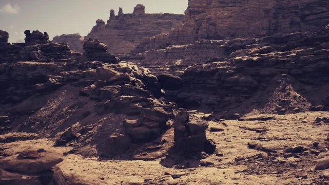 Close examination of sedimentary rock features. Careful inspection of geological formations shows sediment layers and surface weathering marks