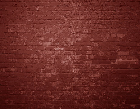 Verwitterte rote Backsteinmauer als rustikaler Hintergrund