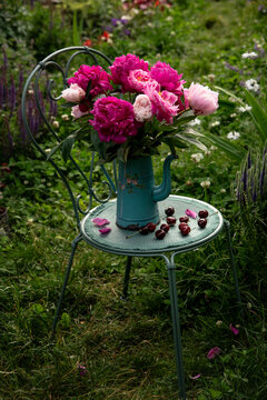 Peonies Bouquet in Vintage Garden Setting with Country Style Decor