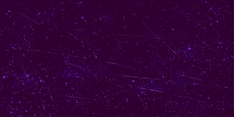 A dark abstract background featuring blue stardust and glowing particles floating across a deep space nebula within a starry night cosmos © MOHAMMADELIUS