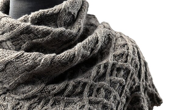 Textured knitted poncho isolated on the white background 