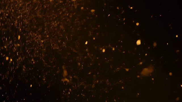 暗闇に広がる高密度な火花のドラマチック抽象背景