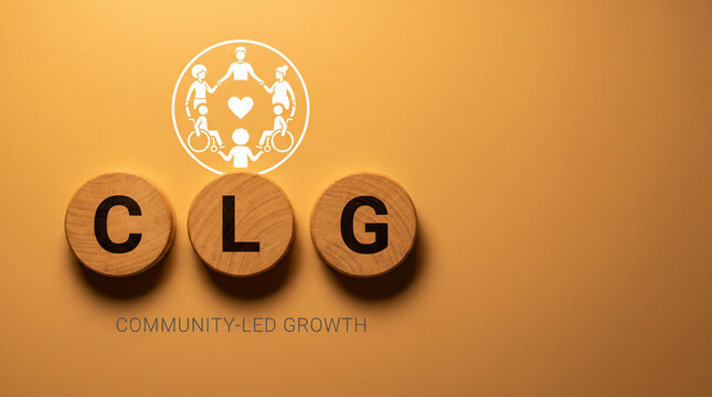 Three natural wood discs spelling CLG with a connected community circle icon above on a warm amber background for community-led growth strategy.