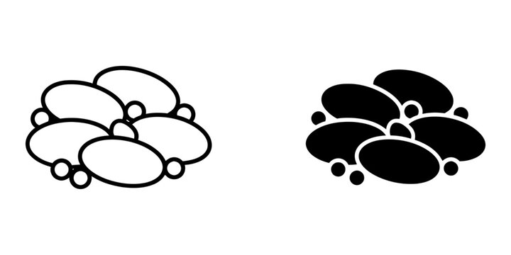 Collection of seven small ovals and circles graphic elements in outline and solid black versions for design.