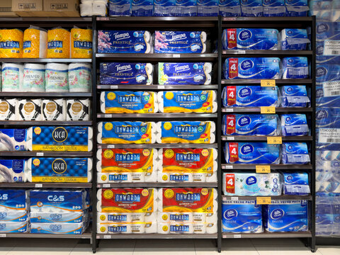 PENANG, MALAYSIA - FEB 05, 2026: Bathroom tissue and toilet paper products displayed on supermarket retail shelves in household essentials aisle.