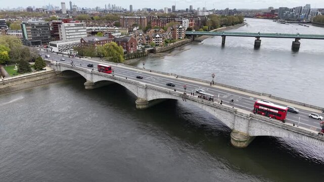 Traffic crossing Putney bridge West London drone aerial view