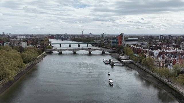 Traffic crossing Putney bridge West London drone push in shot 4K footage