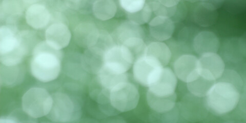 Soft green abstract background with smooth bokeh effect © Hendri