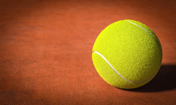 Tennis ball resting on a clay court surface 3d
