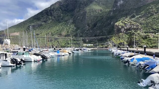 View of seaport and yacht marina by Garachico town on the northern coast of Tenerife, Canary Islands,Spain, 4K.	