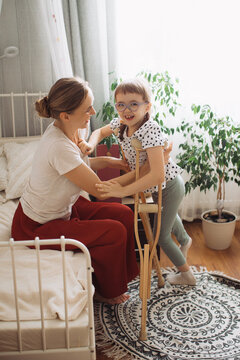 Mother and child smiling, connecting at home