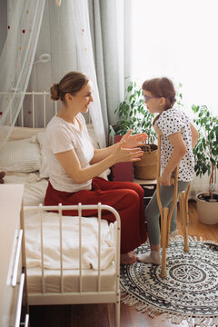 Mother and child spending time at home communicating
