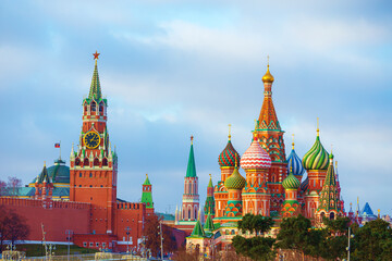 Fototapeta premium Spasskaya Tower and St. Basil's Cathedral. The main symbols of Moscow.
