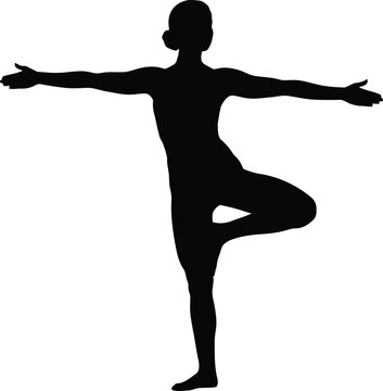 Silhouette of a person performing the tree pose yoga asana