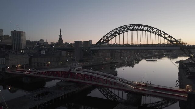 Tyne and Swing Bridges over the River Tyne in Newcastle during the dawn blue hour. Shot from High Level Bridge