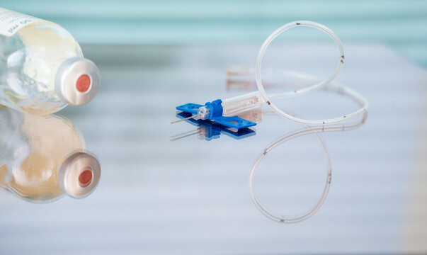 syringe and empty vial on clinical surface, end life decision, ethical dilemma euthanasia, assisted dying, vaccination sterile equipment, clinical sterile environment, control over life and death