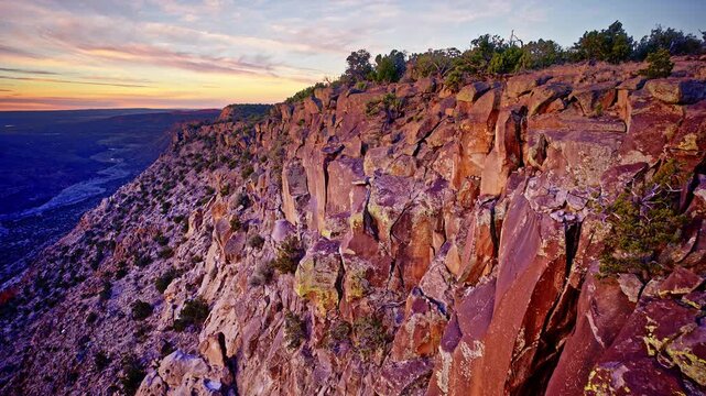 Drone footage showcasing the scale and texture of a red rock canyon from above