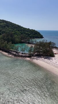 Vertical Aerial Approach to Koh Tae Nai Lagoon with Turquoise Water and View Toward Koh Phangan Thailand