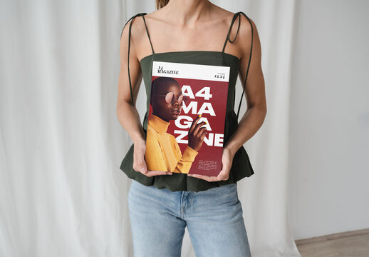 Mockup Of Woman Holding Customizable A4 Magazine