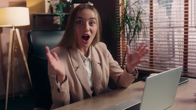 Surprised successful Caucasian business woman with laptop saying wow reading amazing wonderful news businesswoman with computer looking at camera open mouth winning female girl win growth at office