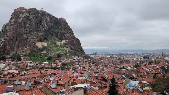 A view of Afyonkarahisar's old town from the foothills of the castle on a rainy spring day.